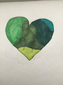 green stitched up heart