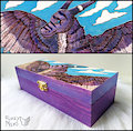 Purple dragon-art burned on a wooden box