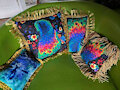 Rainbow peacock pillows by bladespark