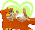 A cute kitty snug in a big plush bear!