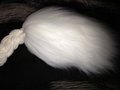 white yarn tail WIP